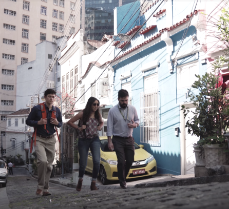 Students in Brazil walking up a hill