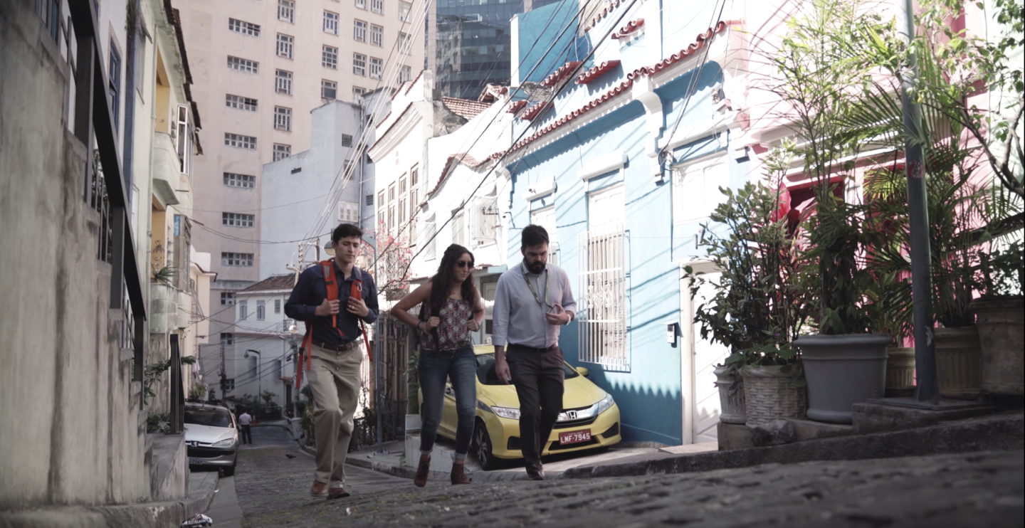 Students in Brazil walking up a hill