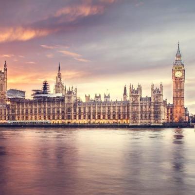 Big Ben clocktower in background with the river in the foreground